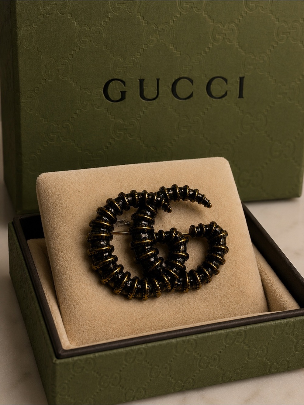 Gucci stamped Gold-Tone Coiled GG Pin Brooch